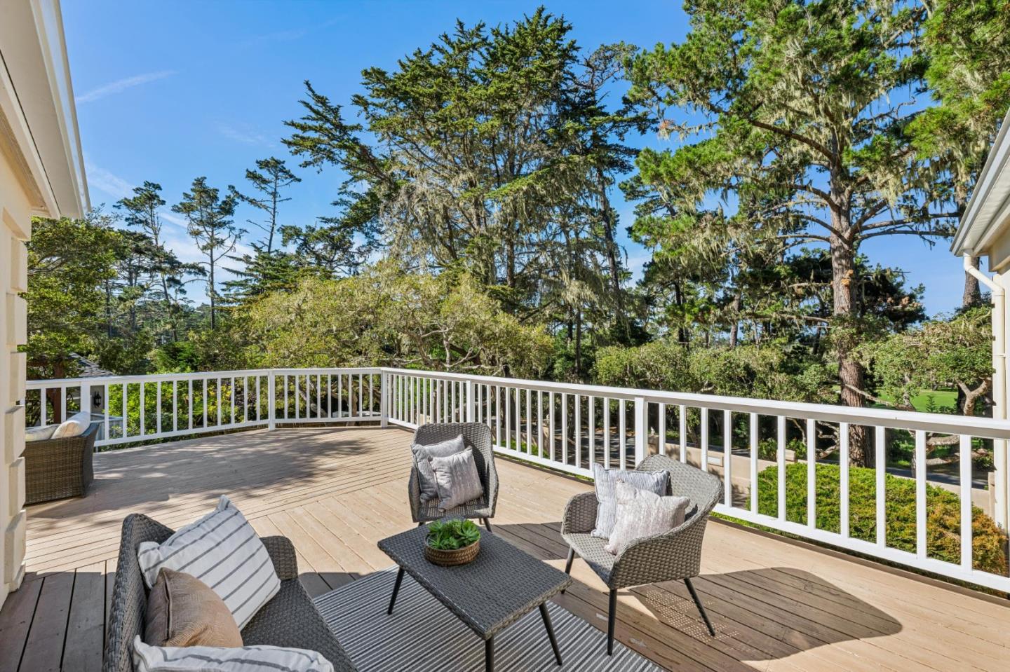 2905 Bird Rock Road Pebble Beach, CA 93953 - Photo 29 of 33 a view of a chair and table on the deck