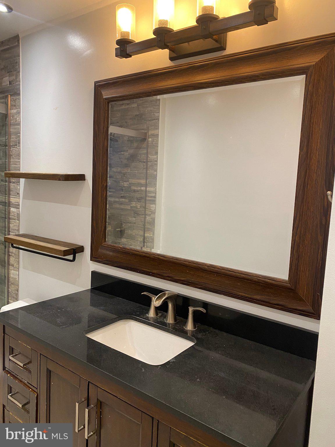 106 Parkview Road Stratford, NJ 08084 - Photo 8 of 27 Elegant bathroom with modern fixtures.