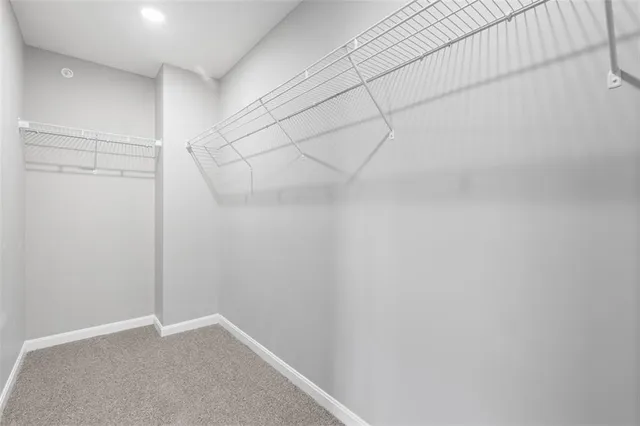 a view of a room with racks on the wall