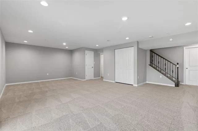 a view of an empty room with a entryway