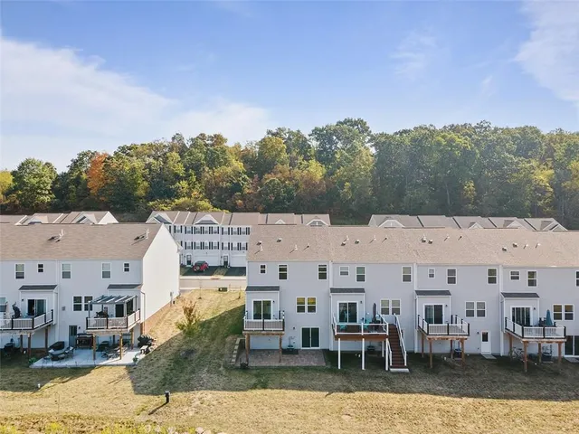 a large building with a large tree in front of it