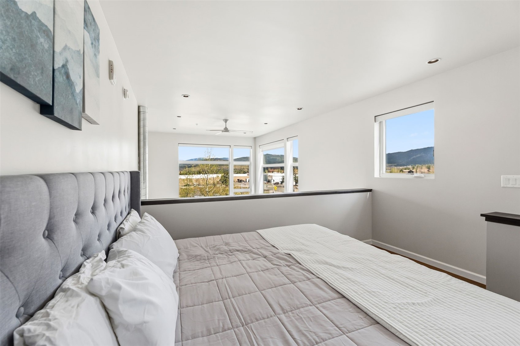 100 Basecamp Way, Unit 223 Frisco, CO 80443 - Photo 16 of 41 a bedroom with a large bed and a window