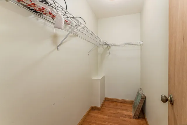 a view of a room with racks on the wall