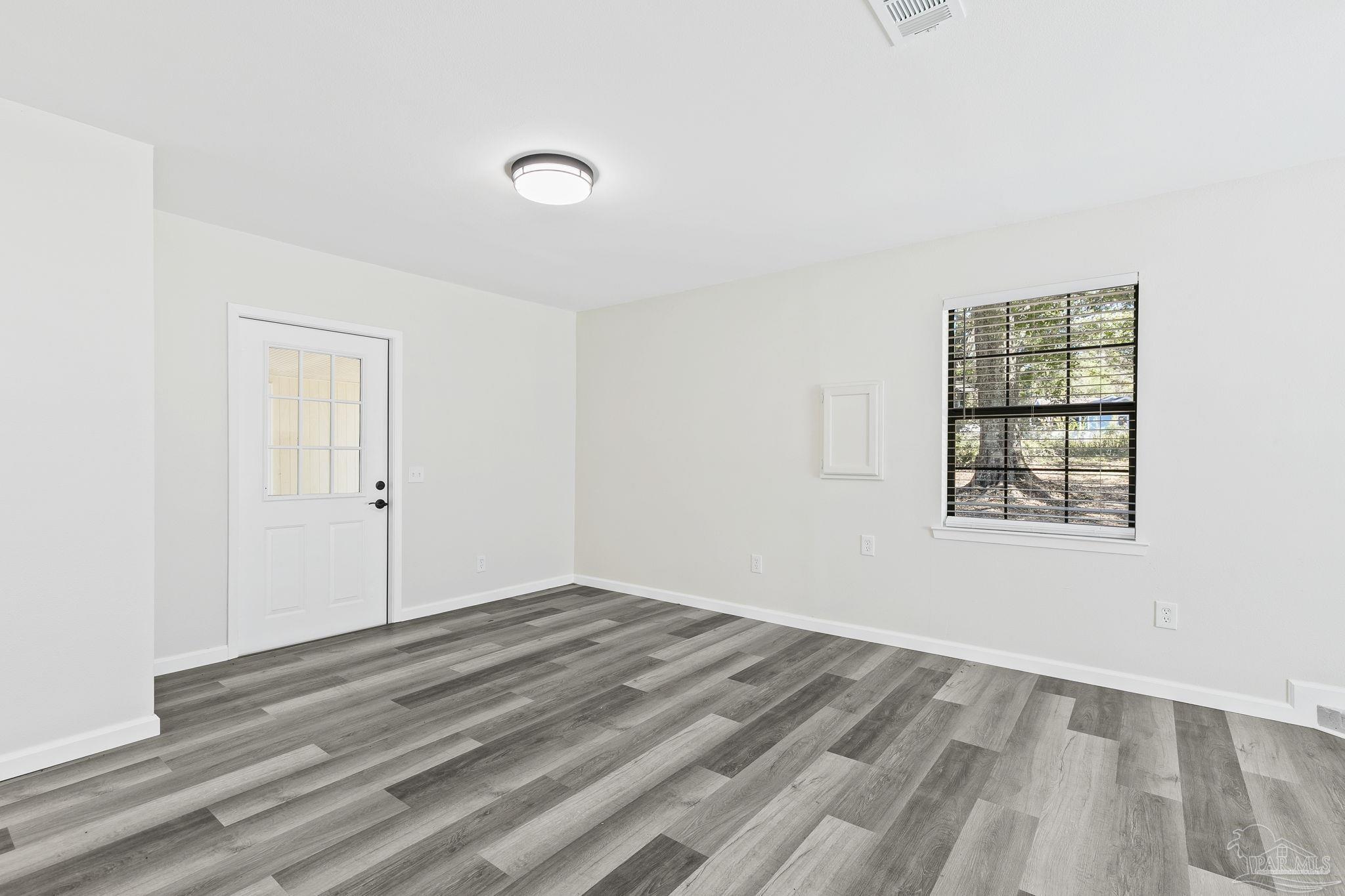 4200 Rigby Road Century, FL 32535 - Photo 14 of 71 an empty room with windows