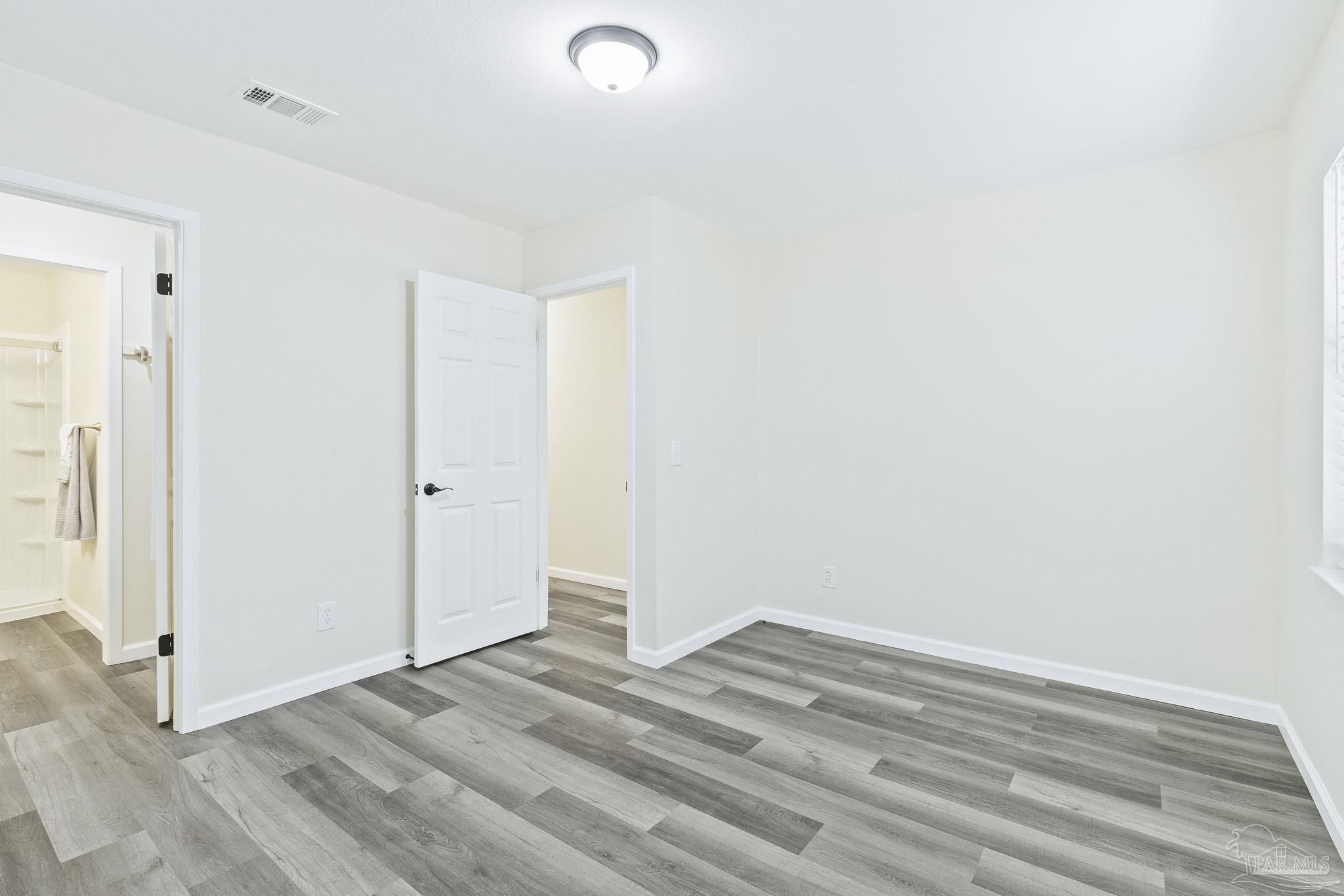4200 Rigby Road Century, FL 32535 - Photo 22 of 71 a view of a room with wooden floor