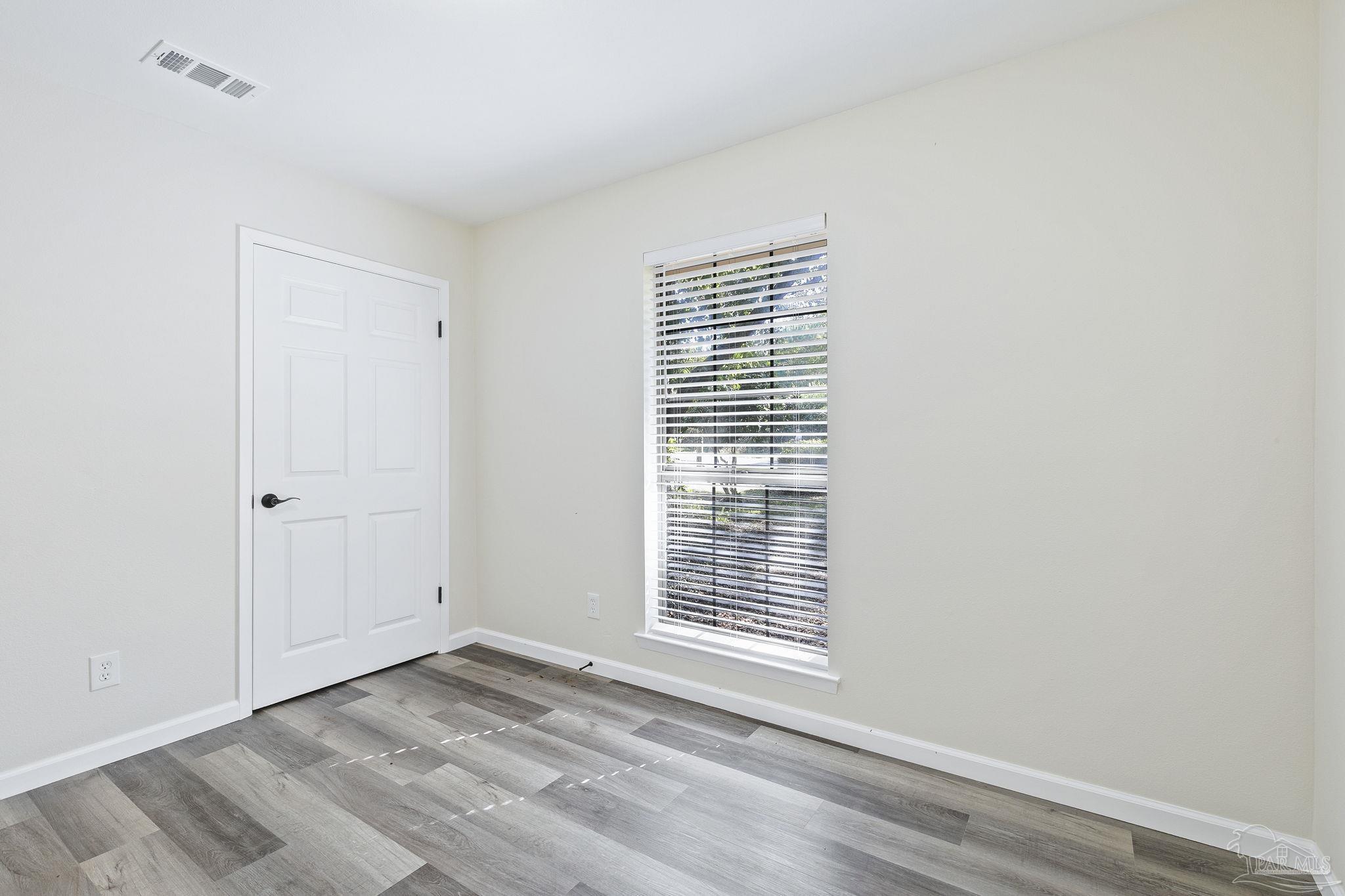4200 Rigby Road Century, FL 32535 - Photo 34 of 71 a view of an empty room with a window
