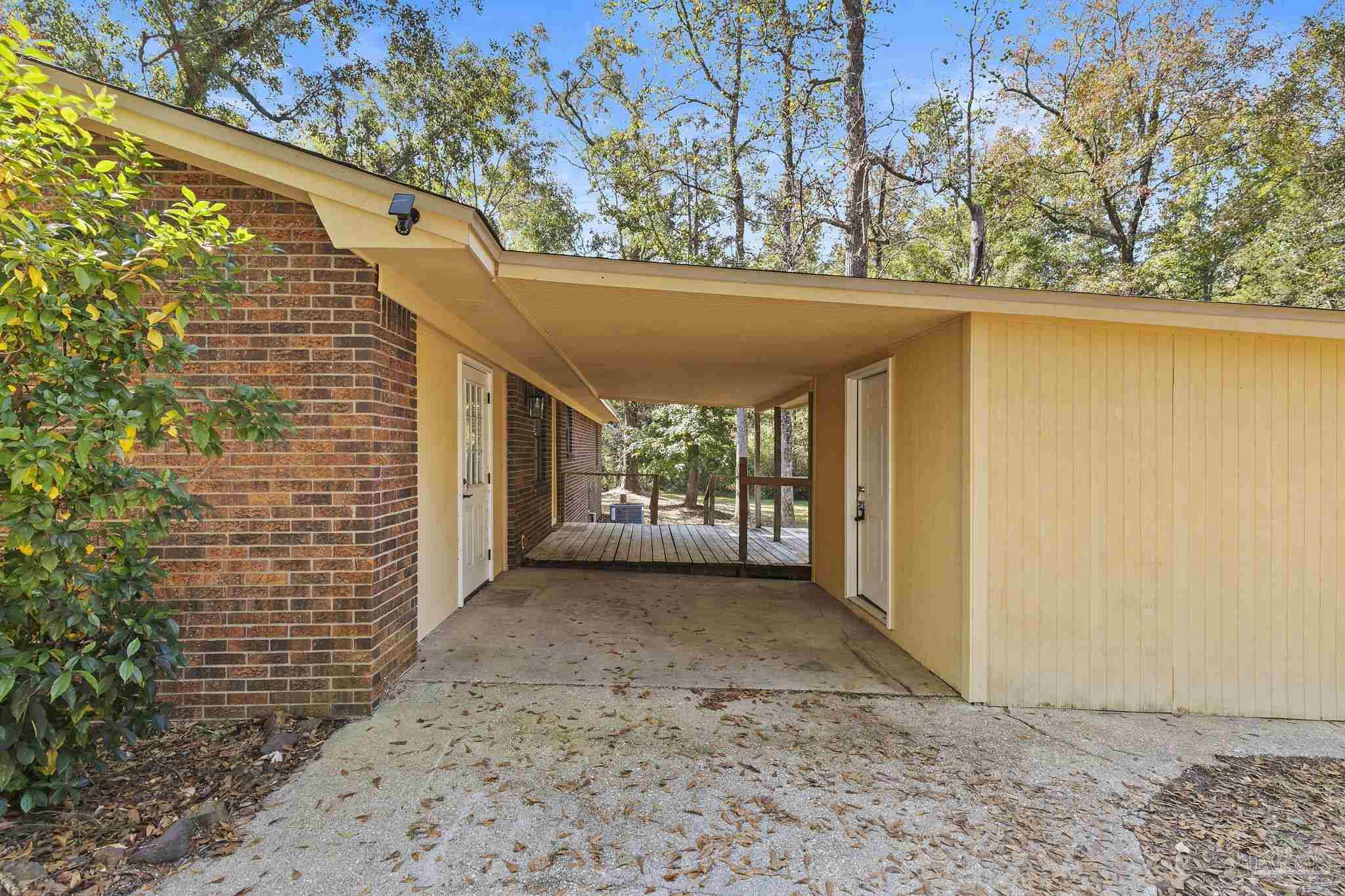 4200 Rigby Road Century, FL 32535 - Photo 49 of 71 a view of a pathway both side of house