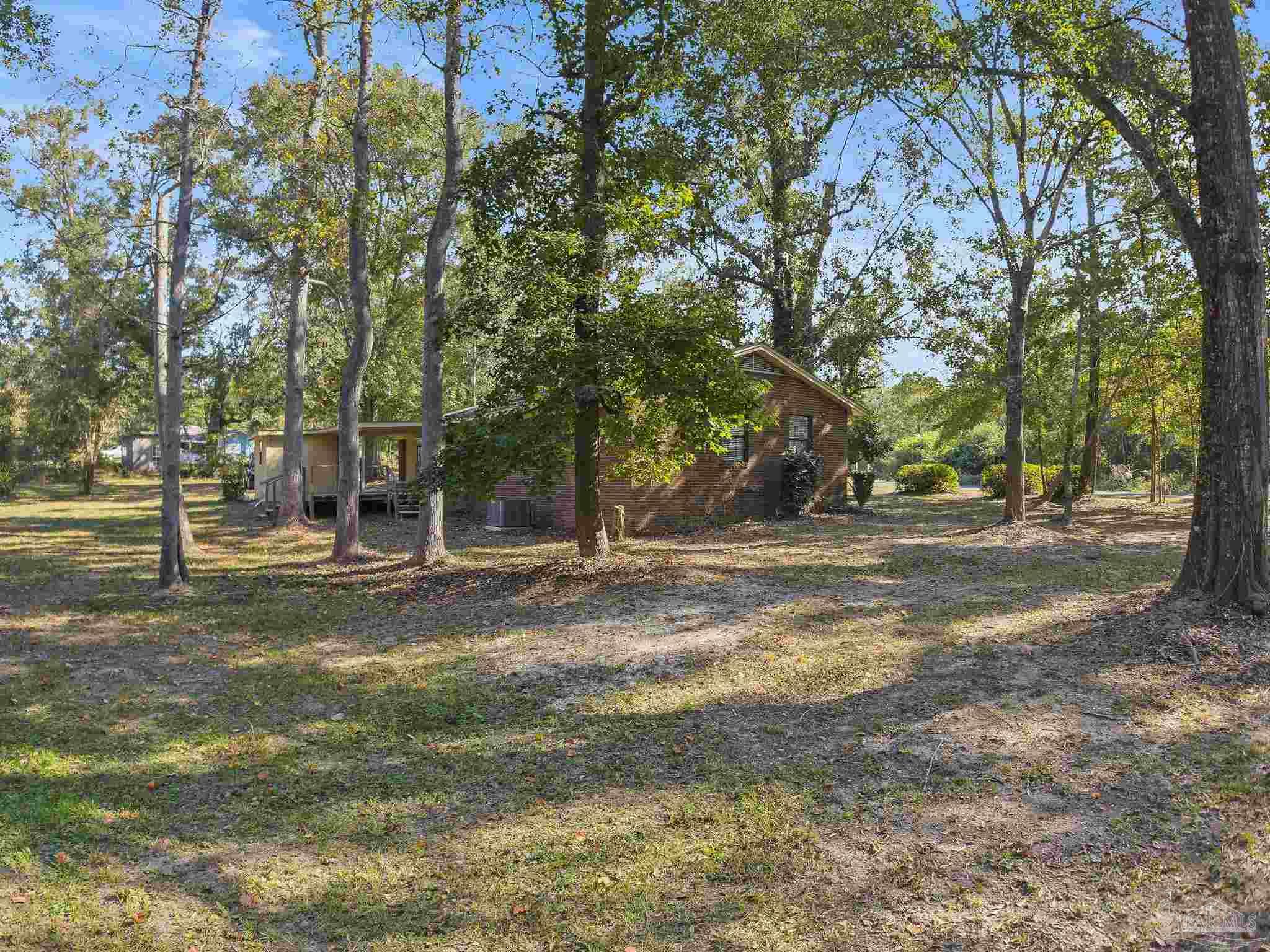 4200 Rigby Road Century, FL 32535 - Photo 58 of 71 a view of a trees in a yard