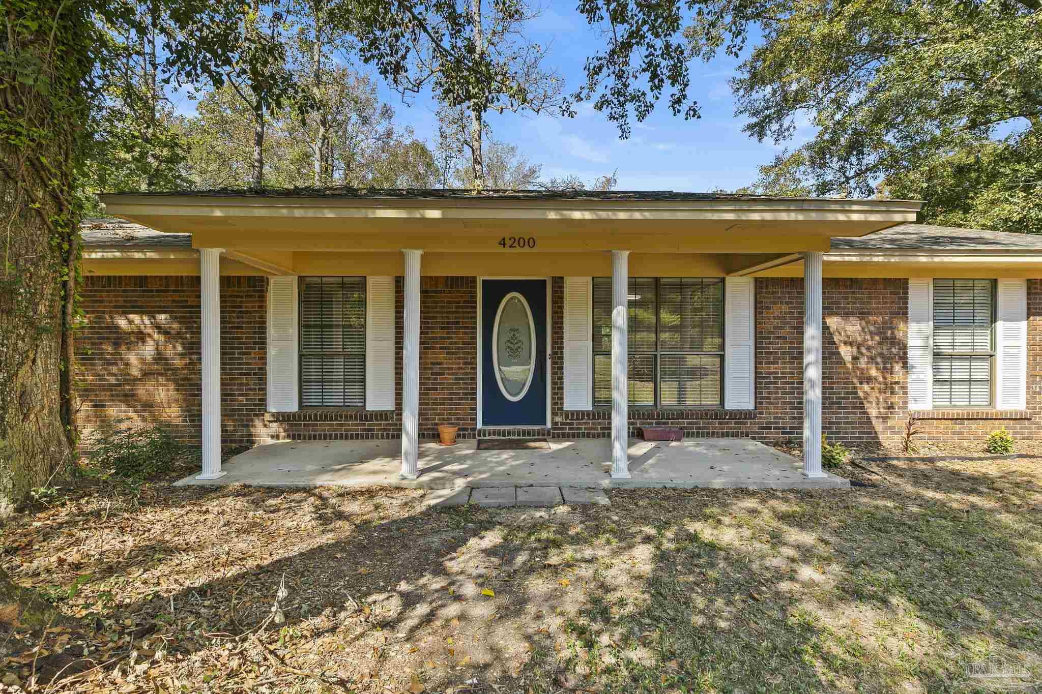 4200 Rigby Road Century, FL 32535 - Photo 8 of 71 a front view of a house