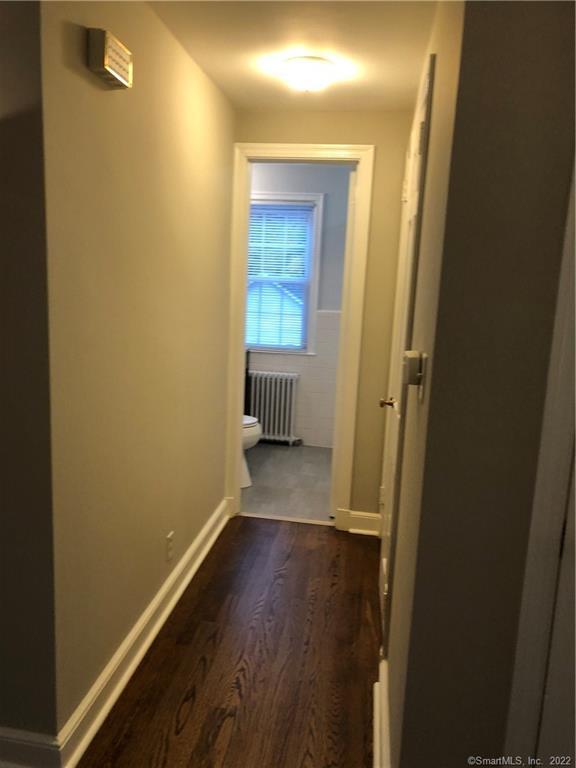66 Hillandale Road, Unit 2 Fairfield, CT 06825 - Photo 11 of 33 a view of a room with wooden floor