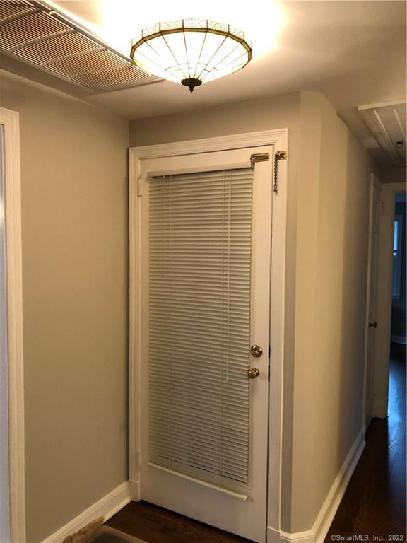 66 Hillandale Road, Unit 2 Fairfield, CT 06825 - Photo 14 of 33 a bathroom with a large mirror and a shower