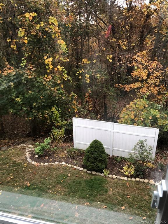 66 Hillandale Road, Unit 2 Fairfield, CT 06825 - Photo 30 of 33 a view of a yard