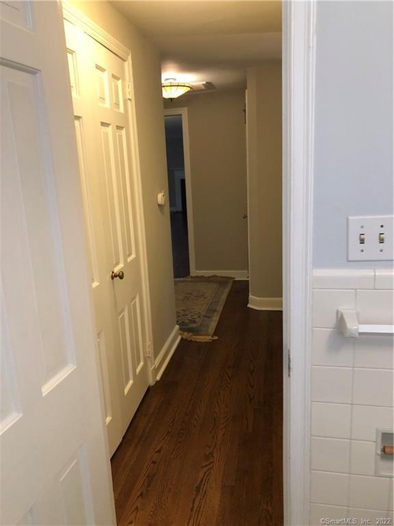66 Hillandale Road, Unit 2 Fairfield, CT 06825 - Photo 6 of 33 a view of a bathroom with a tub and shower