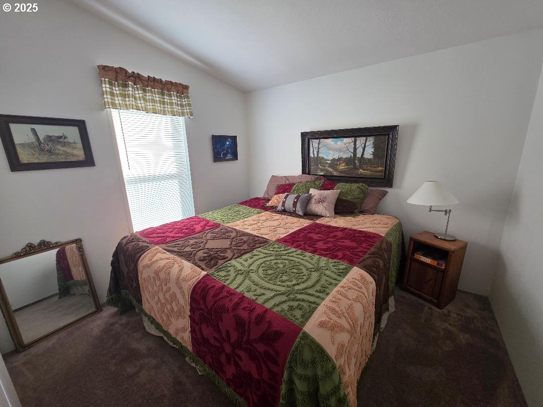232 South Oak Road Wamic, OR 97063 - Photo 19 of 31 a bedroom with bed and window