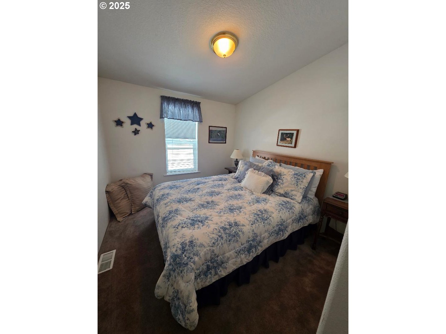 232 South Oak Road Wamic, OR 97063 - Photo 21 of 31 a bedroom with a bed and a window