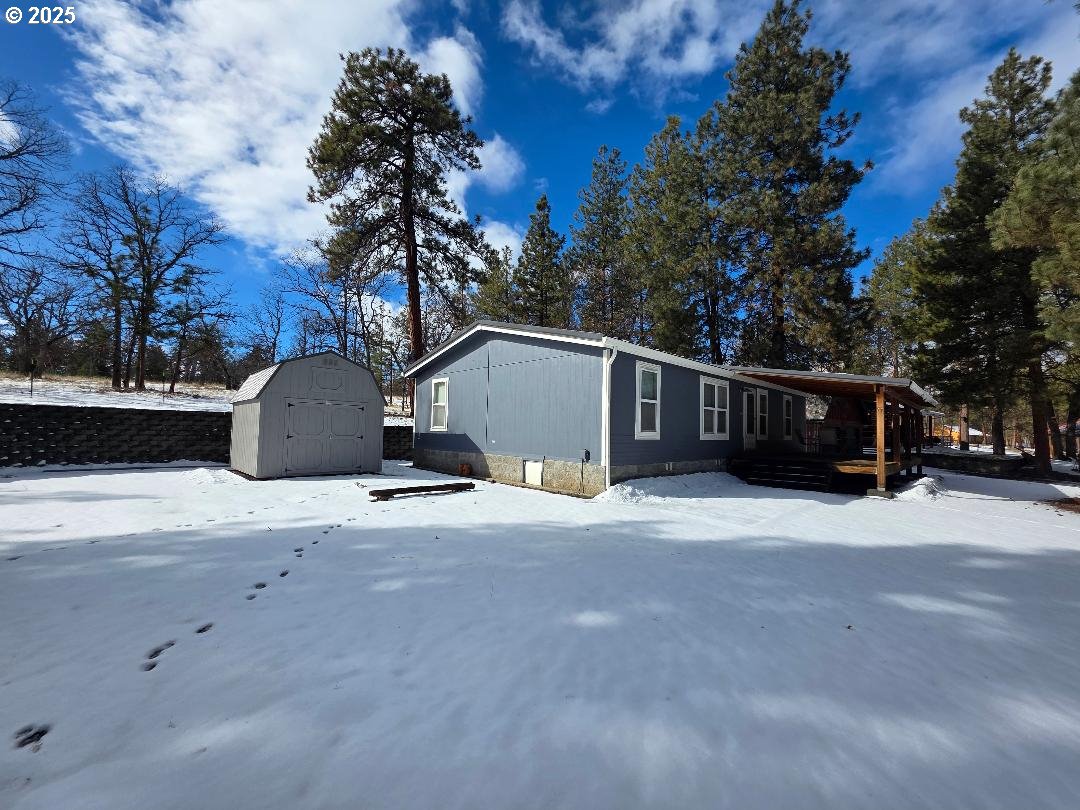 232 South Oak Road Wamic, OR 97063 - Photo 5 of 31 a view of a house with backyard and trees