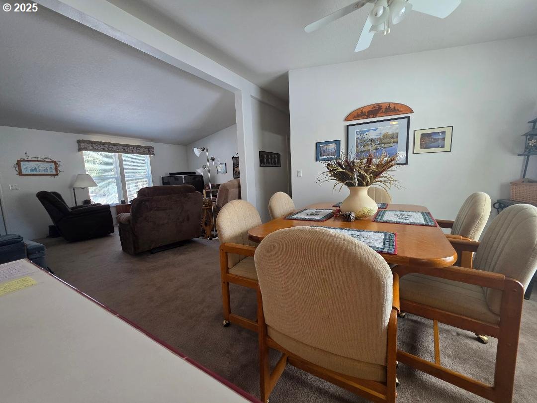 232 South Oak Road Wamic, OR 97063 - Photo 10 of 31 a living room with furniture a couch and two windows