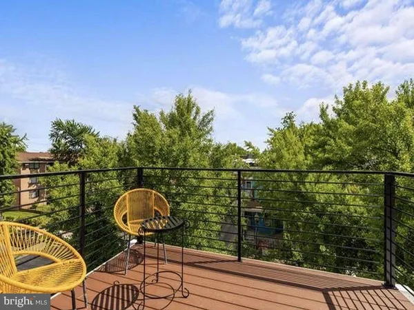 a street view with tall buildings