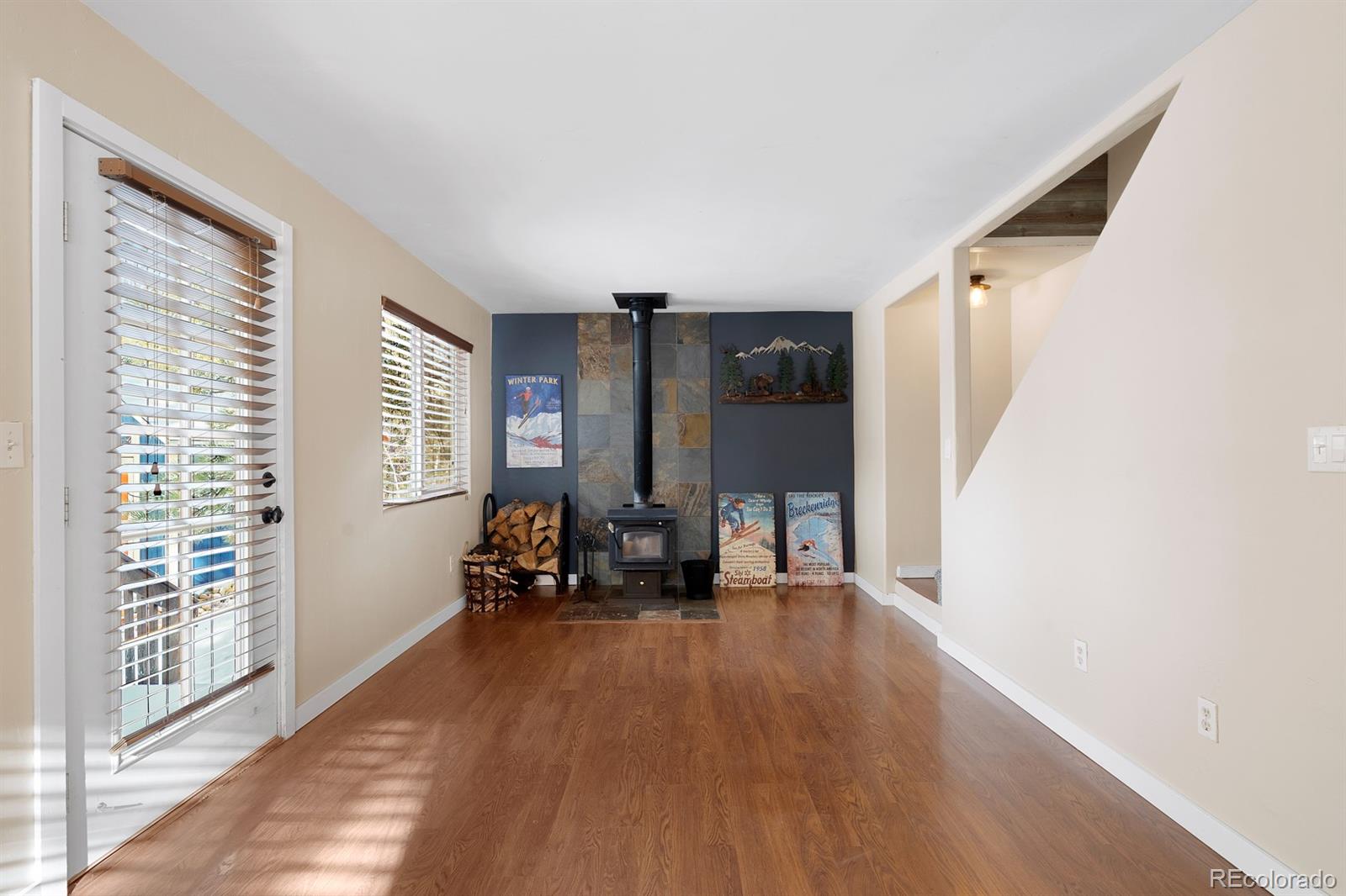 437 Kutsu Ridge Road Florissant, CO 80816 - Photo 5 of 24 a living room with furniture and large windows