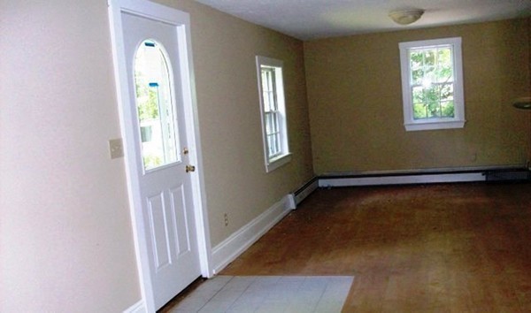 292 Princeton Road Sterling, MA 01564 - Photo 8 of 13 an empty room with windows