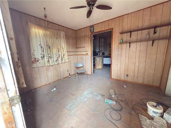 a kitchen with stainless steel appliances a stove a sink and a refrigerator