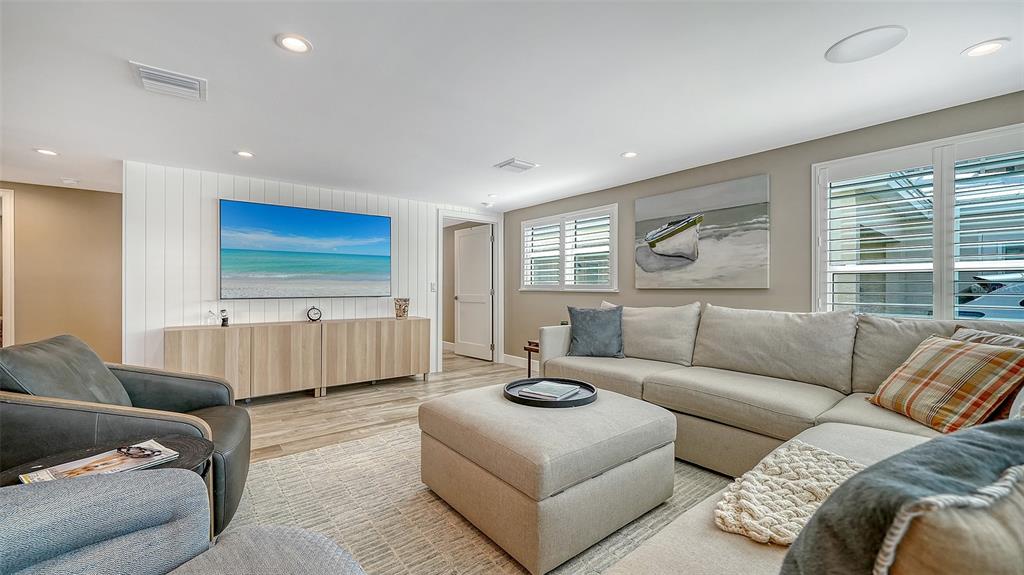 6140 Midnight Pass Road, Unit B6 Sarasota, FL 34242 - Photo 12 of 63 a living room with furniture and a large window