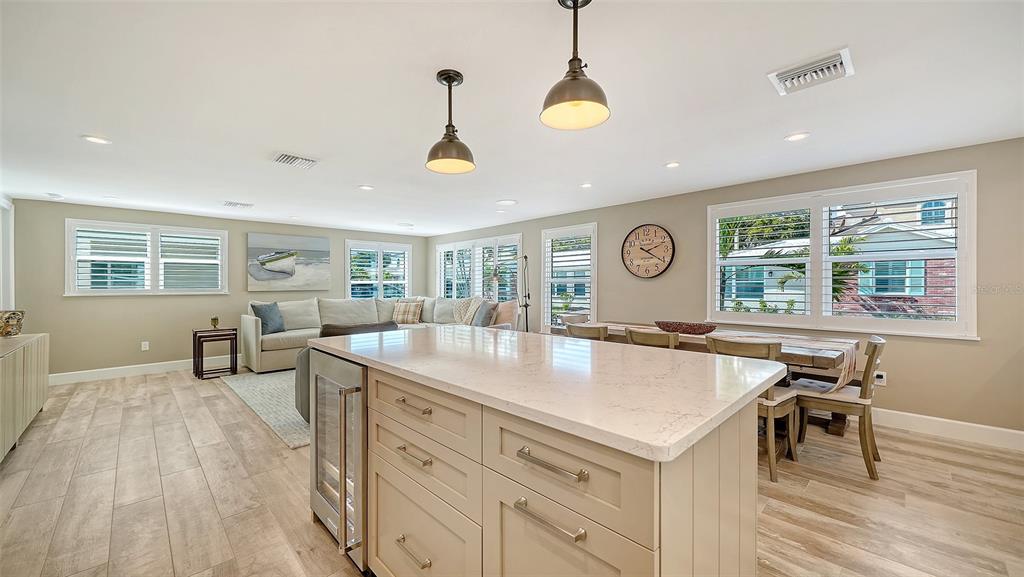 6140 Midnight Pass Road, Unit B6 Sarasota, FL 34242 - Photo 19 of 63 a view of kitchen island attached living room