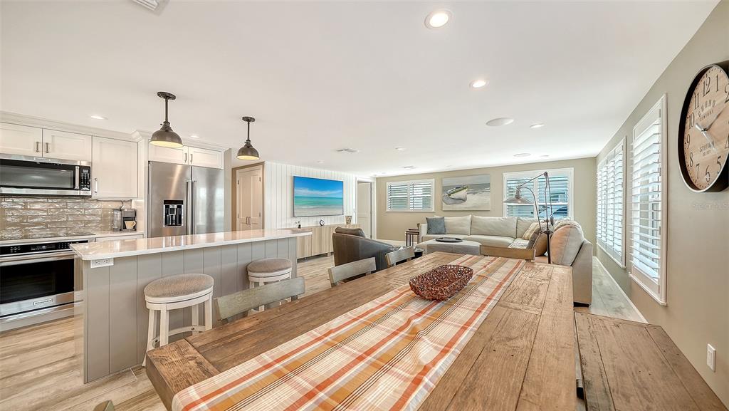 6140 Midnight Pass Road, Unit B6 Sarasota, FL 34242 - Photo 22 of 63 a very nice looking living room with a large window