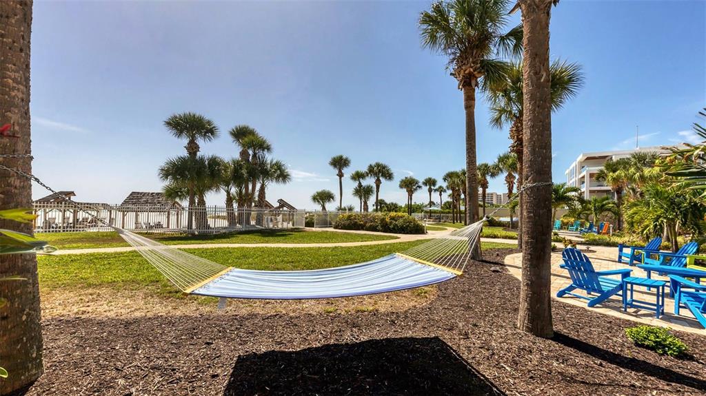 6140 Midnight Pass Road, Unit B6 Sarasota, FL 34242 - Photo 45 of 63 a view of a park with palm trees