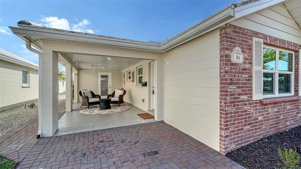6140 Midnight Pass Road, Unit B6 Sarasota, FL 34242 - Photo 8 of 63 a view of a entryway door of the house