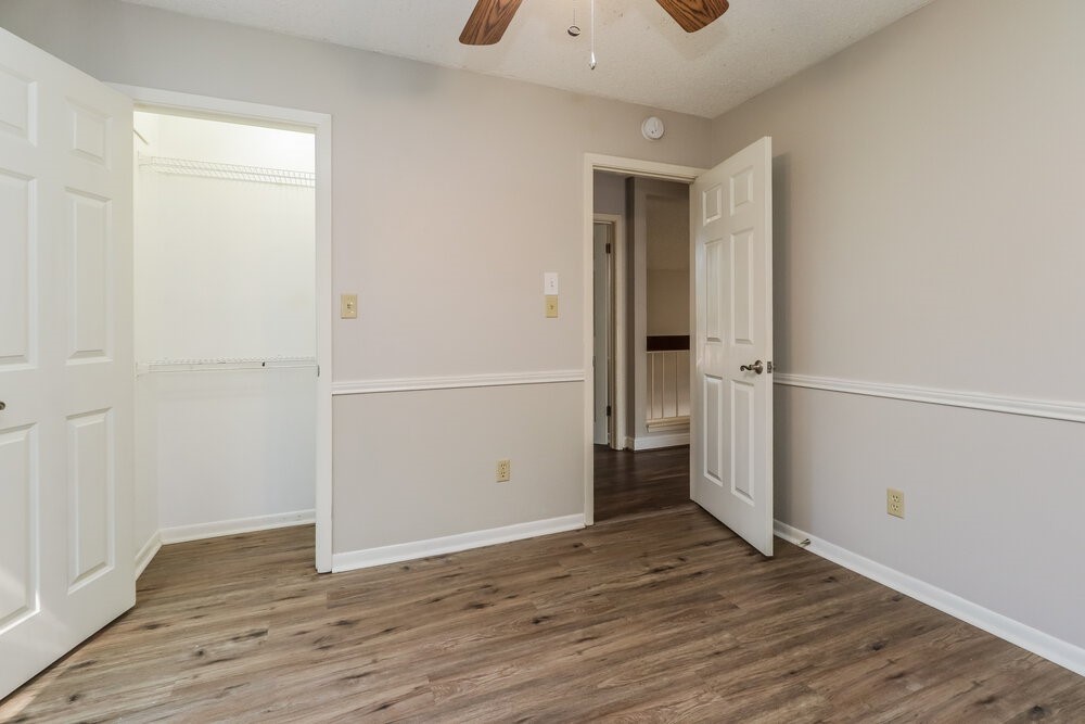 7811 Goldengrove Drive Spring, TX 77379 - Photo 14 of 17 an empty room with wooden floor