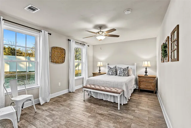 a bathroom with a sink a vanity and a mirror