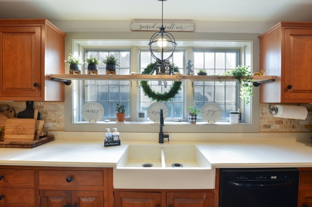3 Academy Road Sandwich, MA 02563 - Photo 14 of 41 a kitchen with a sink a counter space cabinets and appliances