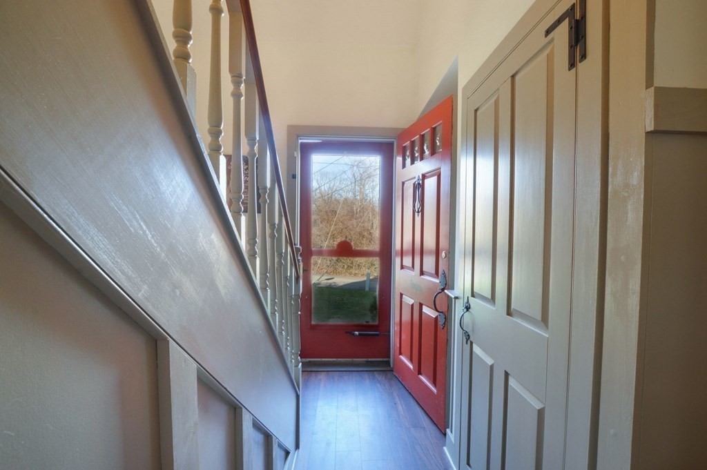 3 Academy Road Sandwich, MA 02563 - Photo 20 of 41 a view of an entryway with wooden floor and door