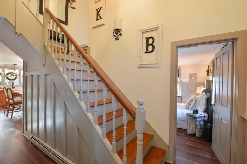 3 Academy Road Sandwich, MA 02563 - Photo 21 of 41 a view of entryway and hall with wooden floor