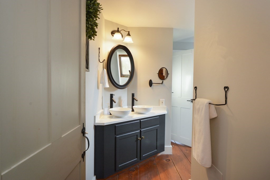 3 Academy Road Sandwich, MA 02563 - Photo 25 of 41 a bathroom with a sink and a mirror