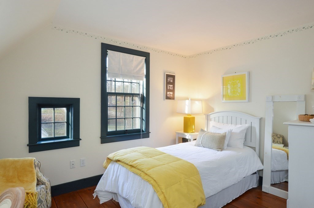3 Academy Road Sandwich, MA 02563 - Photo 29 of 41 a bedroom with a bed and a window