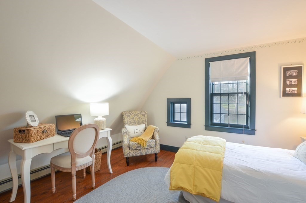 3 Academy Road Sandwich, MA 02563 - Photo 30 of 41 a bedroom with two beds and painting on the wall