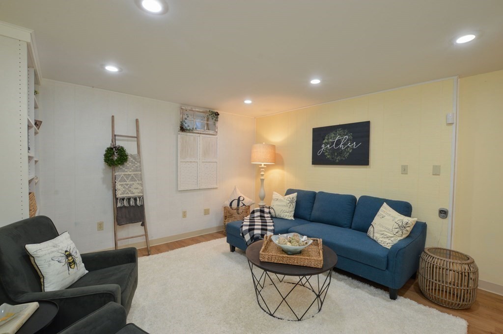 3 Academy Road Sandwich, MA 02563 - Photo 33 of 41 a living room with furniture and a couch