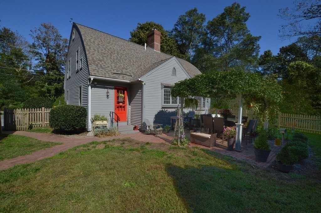 3 Academy Road Sandwich, MA 02563 - Photo 35 of 41 a view of a house with backyard porch and sitting area