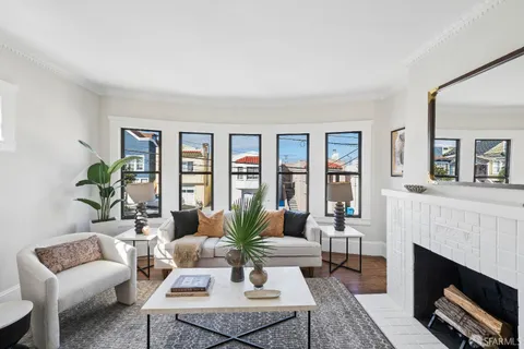 a view of a workspace room with wooden floor