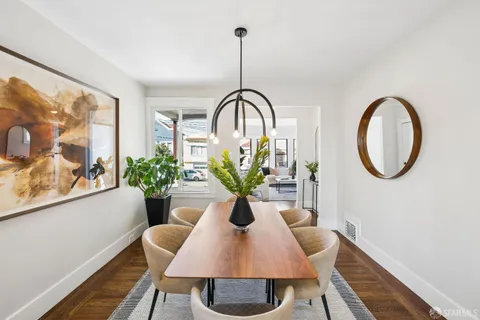a kitchen with stainless steel appliances kitchen island granite countertop a sink and cabinets
