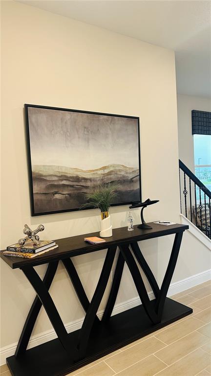 16450 Hamlin View Street Winter Garden, FL 34787 - Photo 11 of 32 a room with table chairs and wooden floor