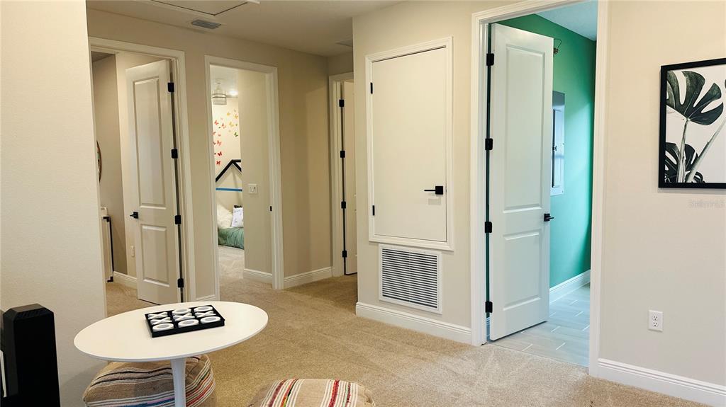 16450 Hamlin View Street Winter Garden, FL 34787 - Photo 15 of 32 a spacious bathroom with a granite countertop sink a mirror and a shower