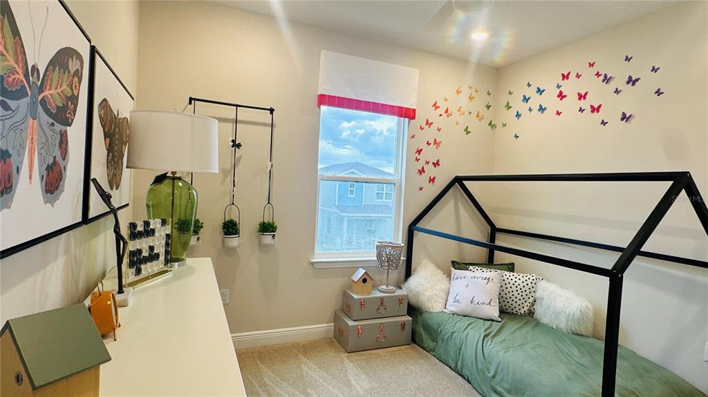 16450 Hamlin View Street Winter Garden, FL 34787 - Photo 24 of 32 a living room with furniture and wooden floor