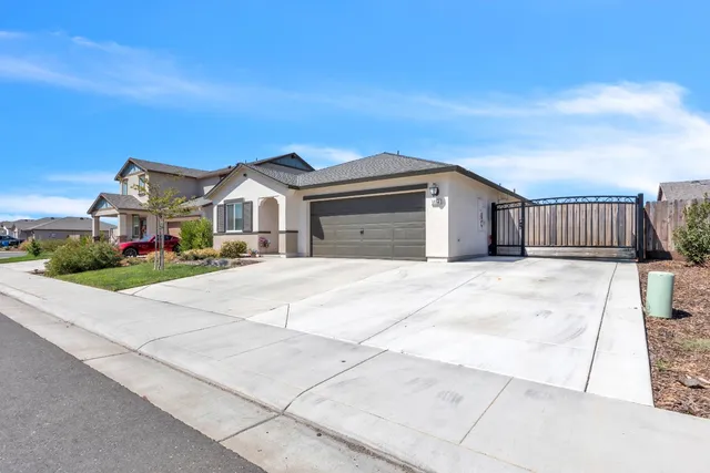 front view of a house with a small yard
