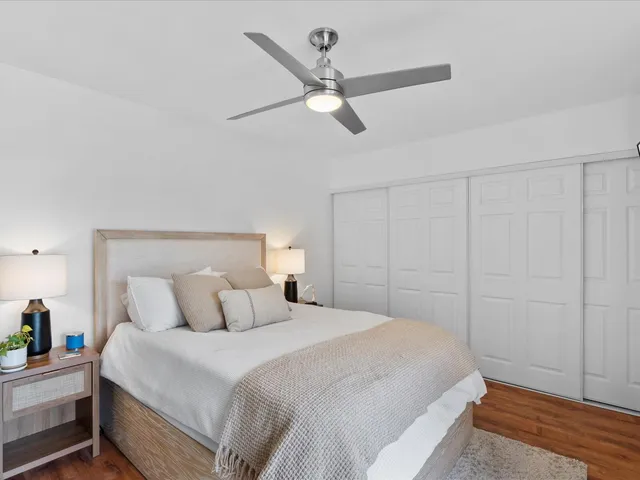 a bedroom with a bed and window