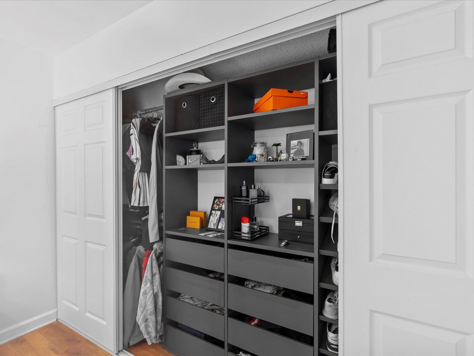 4025 Village Drive, Unit C Delray Beach, FL 33445 - Photo 17 of 32 a room with a refrigerator and rack