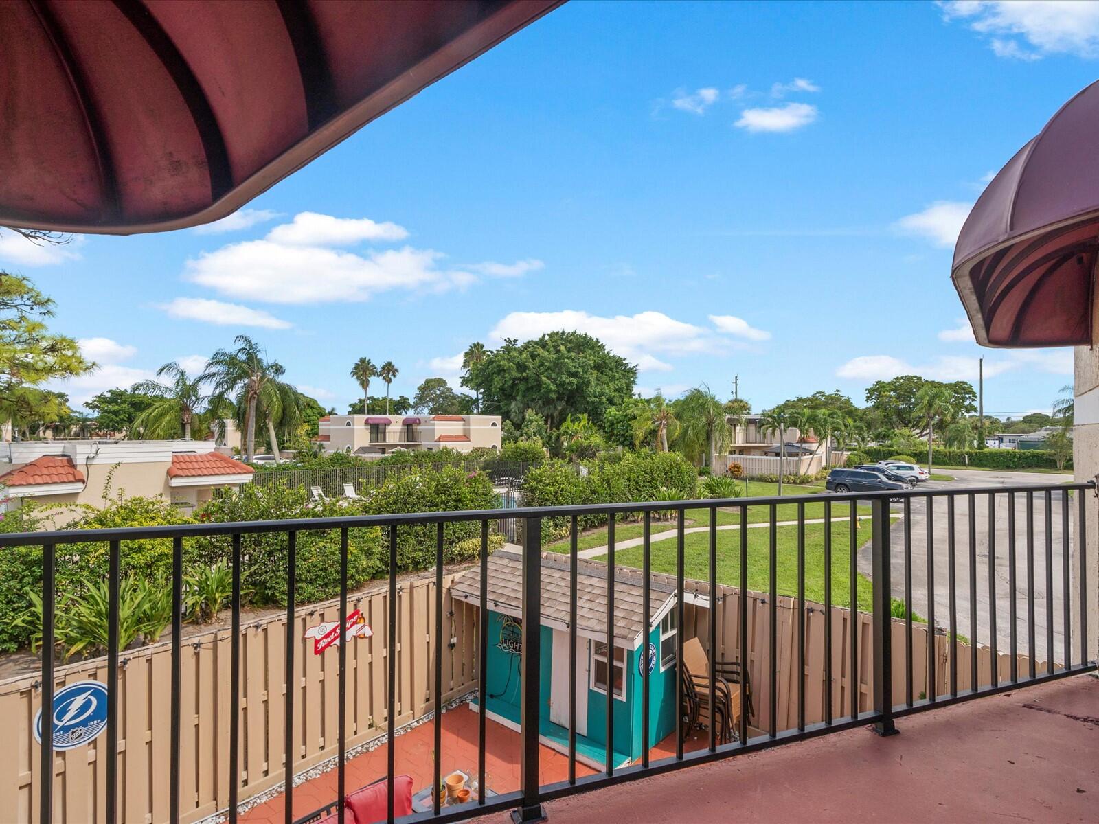 4025 Village Drive, Unit C Delray Beach, FL 33445 - Photo 23 of 32 a view of a balcony