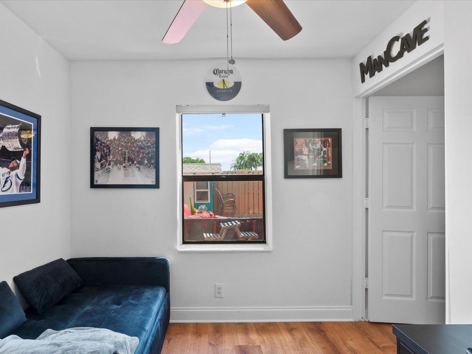 4025 Village Drive, Unit C Delray Beach, FL 33445 - Photo 26 of 32 a living room with furniture and a window